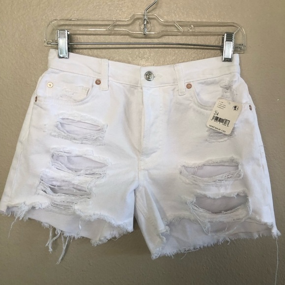 Free People Optic White Maggie Mid-Rise Button Front Fly Distressed Jean Shorts - Picture 1 of 14
